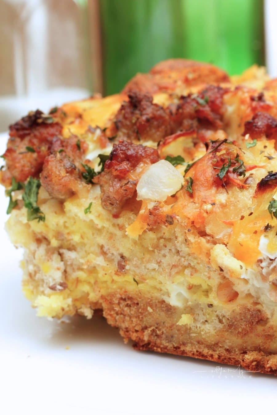 slice of savory crescent roll Breakfast casserole with sausage, egg, and cheese