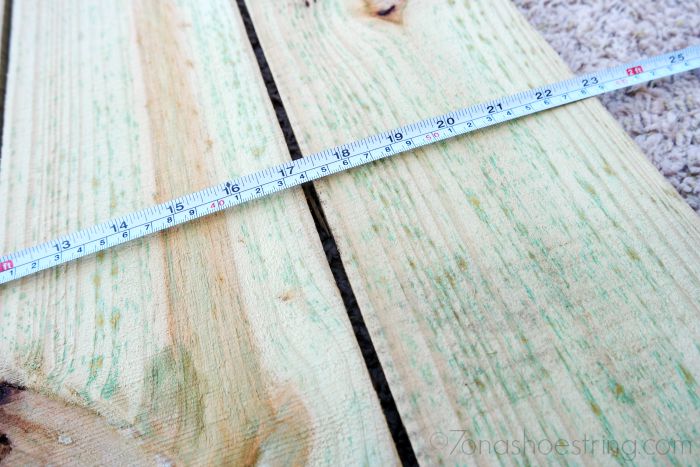 Lay the four fence pickets flat onto your work surface equal distances apart. Lay the four fence pickets flat onto your work surface equal distances apart.