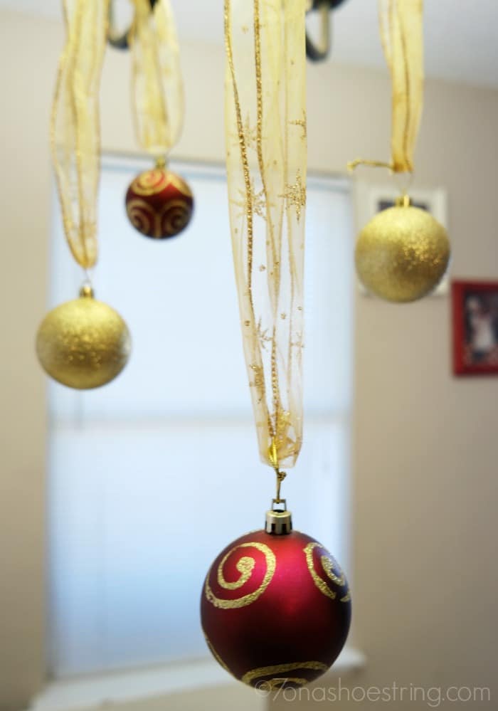 hang Christmas ball ornaments from ribbon