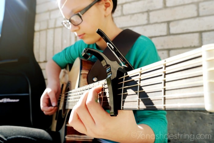 Jaden Faith on guitar