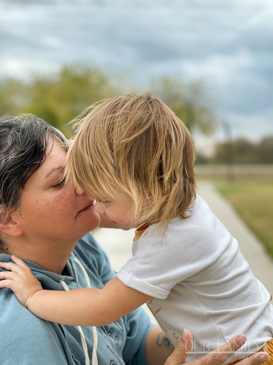 grandmother reading to two granddaughters