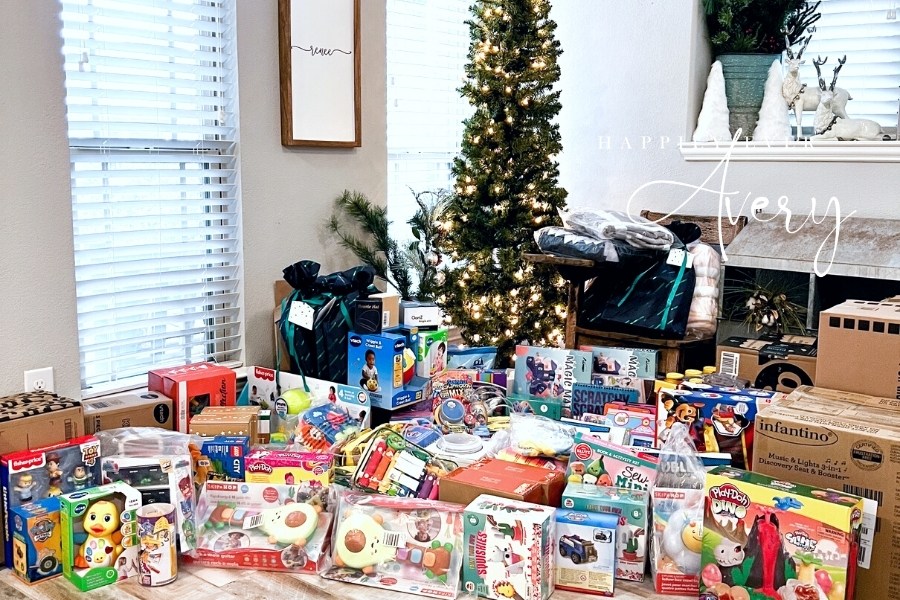 holiday toy drive donations under tree
