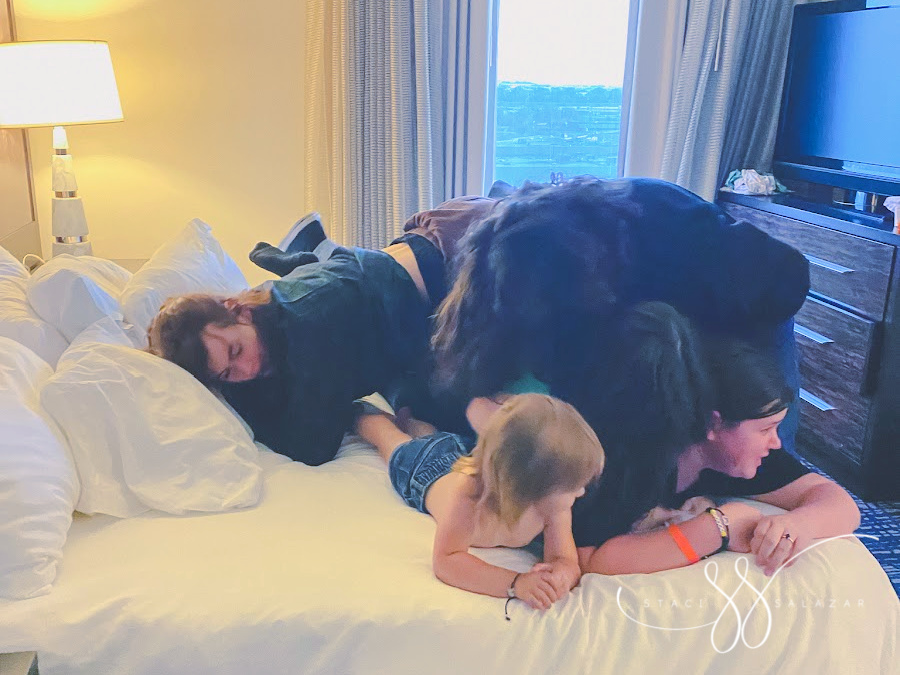 sister dog pile at hotel on mothers day 2021