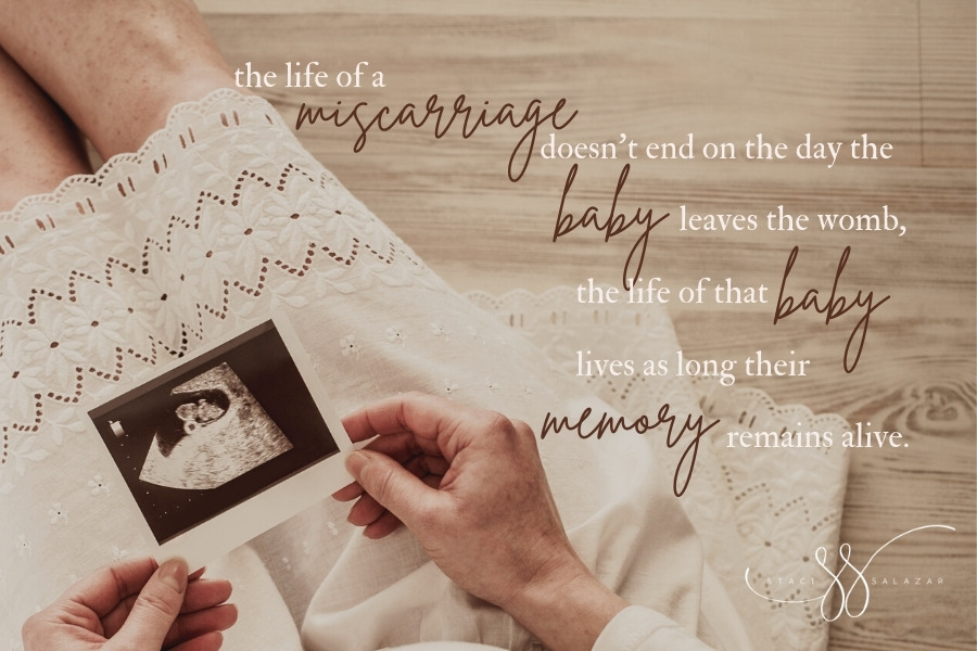 woman holding sonogram with miscarriage quote overlay